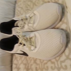 White and black Nike athletic shoes